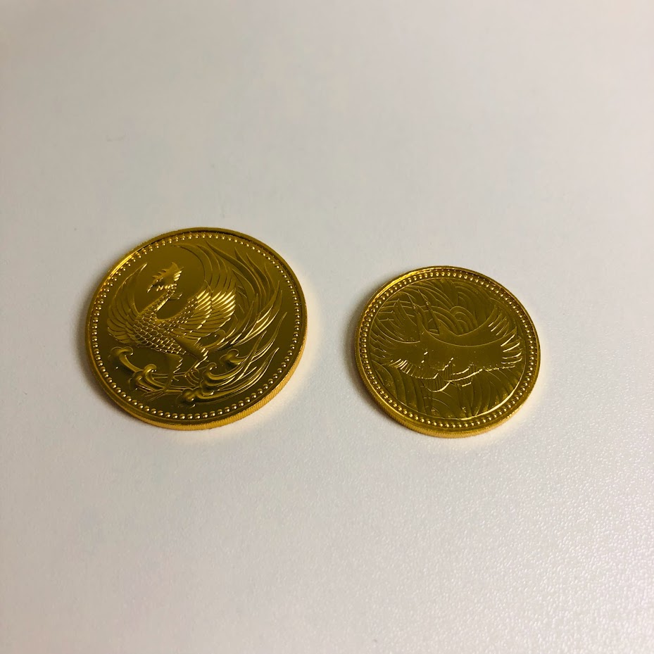 天皇陛下御即位記念金貨・皇太子殿下御成婚記念金貨　表面